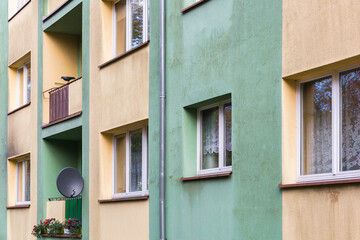 Fototapeta na wymiar Facade of a subsidized housing building in a Polish city