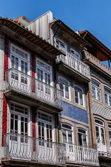 Magnificent architecture: typical colorful buildings in the center of the old town of Guimaraes. Portugal.