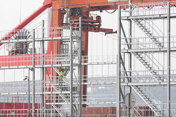 Construction site - the frame of the building under construction in cloudy weather