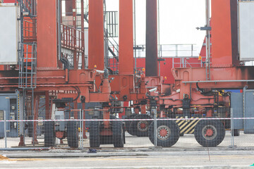 Naklejka premium Red tractors on the construction site