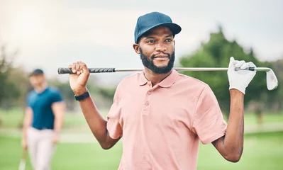 Fotobehang Golf, sports and black man on course with golfing club for game, practice and training for competition. Professional golfer, relax and happy male athlete ready for exercise, activity and recreation © Clayton D/peopleimages.com