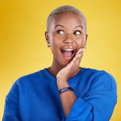 Wow, thinking and eureka with a black woman in studio on a yellow background looking thoughtful or...
