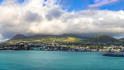 Saint Kitts and Nevis Basseterre scenic panoramic shoreline from cruise ship on Caribbean vacation.
