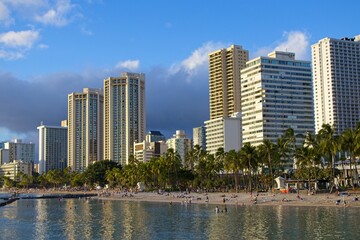 Fototapeta na wymiar High-rise hotels rise above Honolulu's famous Waikiki neighborhood