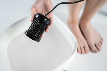 procedure of ionic detox foot bath machine in spa beauty center isolated