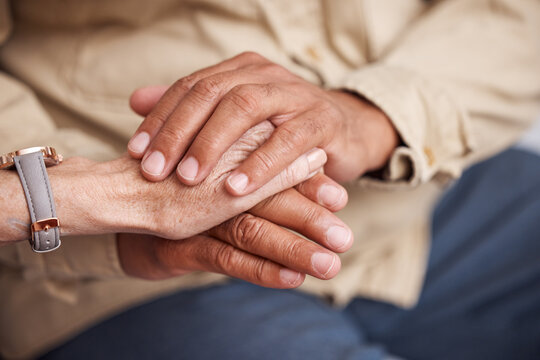 Senior Couple Holding Hands For Support, Love And Comfort Together In Retirement, Cancer Empathy Or Faith Prayer. Closeup Man, Old Woman And Helping Hand With Trust, Care And Psychology Counselling