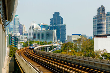 Fototapeta premium BTS Sky Train is running in downtown of Bangkok. Sky train is fastest transport mode in Bangkok 
