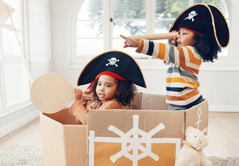 Pirate, box and telescope with children in living room for playful, creative and imagine. Fantasy,...