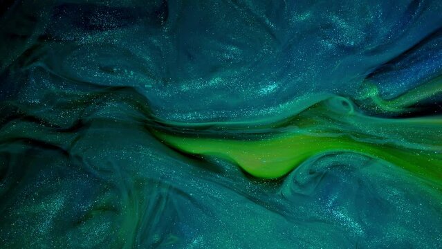 Fluid art Blue, and Green Glitter Flow on a Shimmering Abstract Background