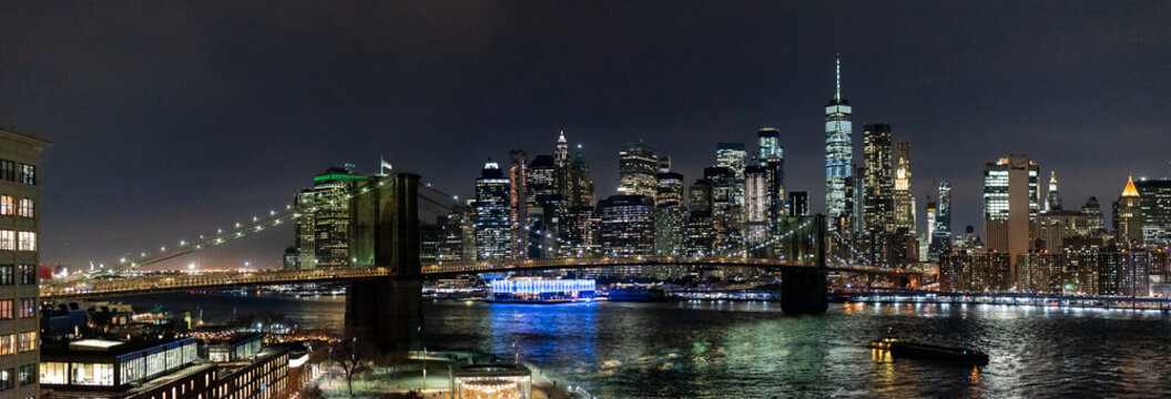Manhattan and Brooklyn bridge Panorama at night