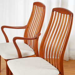 Mid-century modern wooden dining room chairs. 
