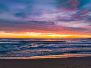 Fototapeta na wymiar Sensational high cloud sunrise at the seaside