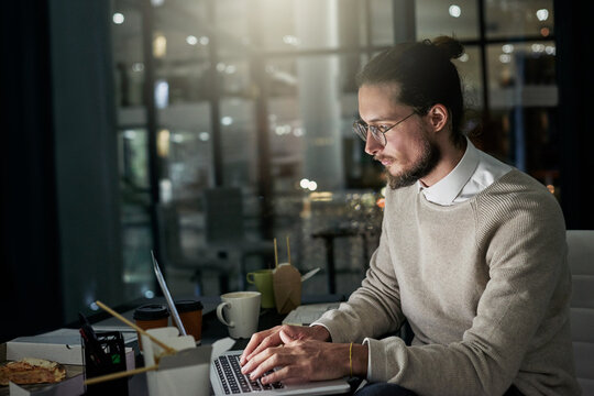 Night working, business man and computer typing of company employee in a office. Technology, web design project and digital planning of a worker busy on a website glitch fix in the dark writing code