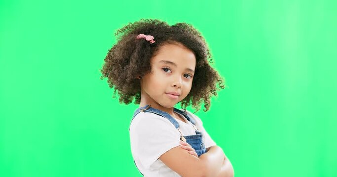 Face, eyebrows and child on green screen with attitude, arms crossed and confident on mockup background. Portrait, confident and girl with emoji, smirk and expression, looking and posing in studio