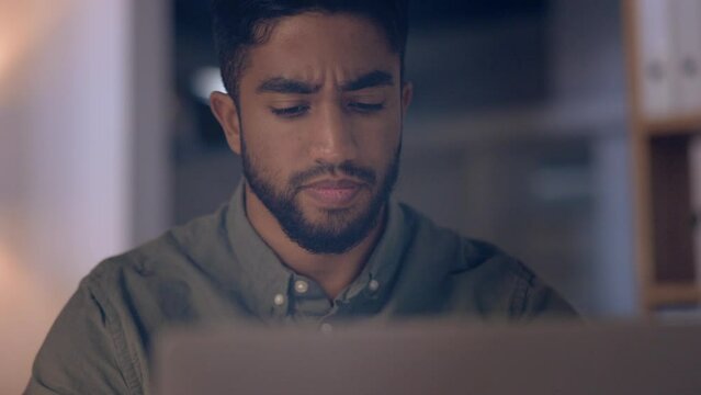 Thinking, concentration and overtime, Indian man at computer in office, idea or solution at tech startup. Focus, internet and businessman typing email, late at night work on future ideas for agency.