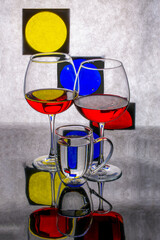 Still life with glasses and colored circles