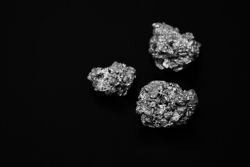 Pure silver or platinum from the mine that was unearthed was placed on the black sand..