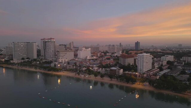 Aerial view of Pattaya sea, beach in Thailand in summer season, urban city with blue sky for travel background. Chon buri skyline.
