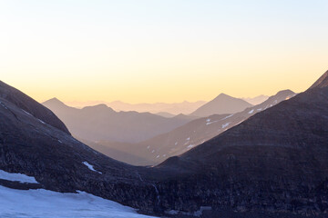 Fototapeta na wymiar Mountain snow panorama with col Fuscherkarscharte during sunrise in Glockner Group, Austria