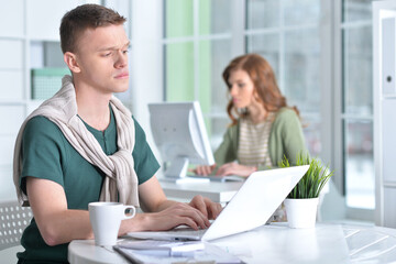 young people working in office