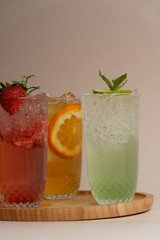 Summer cocktails with pieces of fruit