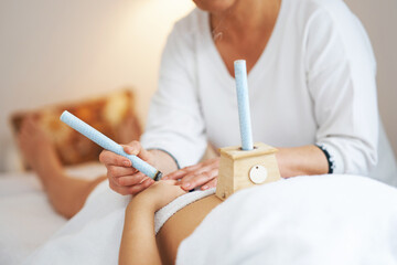 Picture of moxibustion therapy on woman body
