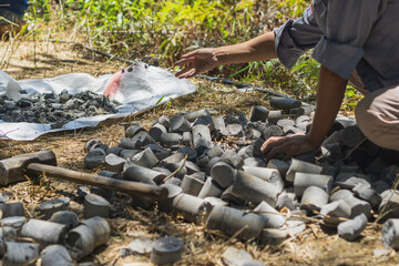 geologist sorting core drilling sample in the fields, coal exploration