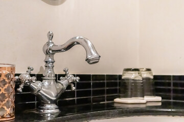 Luxury vintage faucet in the bathroom