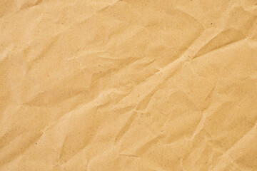 Abstract brown crumpled creased recycle paper texture background