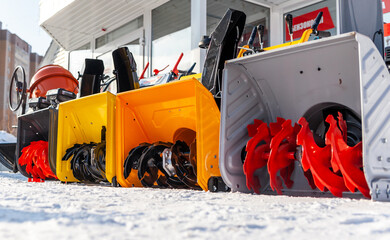 Kemerovo, Russia, February 17, 2022. A new petrol snowplow is on sale. Snow removal mechanism. A...