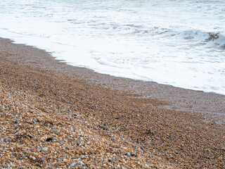 blue sea with waves and sandy shore ,beautiful natural seascape