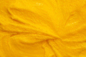 Fruit yogurt ice cream. Smoothies from fresh fruits and berries. Ice cream texture. Delicious sweet dessert close-up as a background.