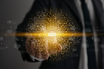 Businessman Touch Screen and 2023 New Year Icon