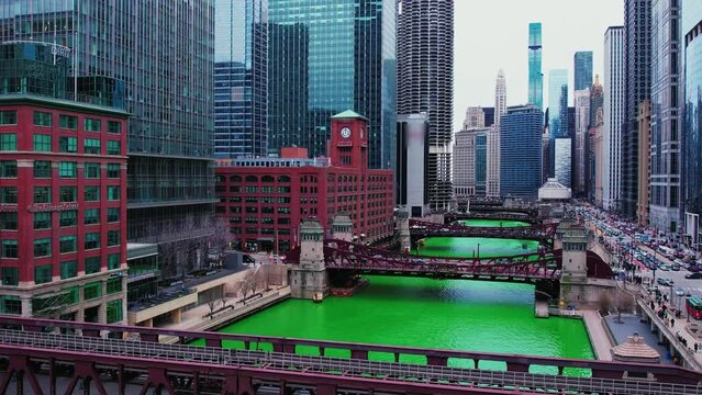 Chicago River on St Patrick Day. Aerial 4k USA