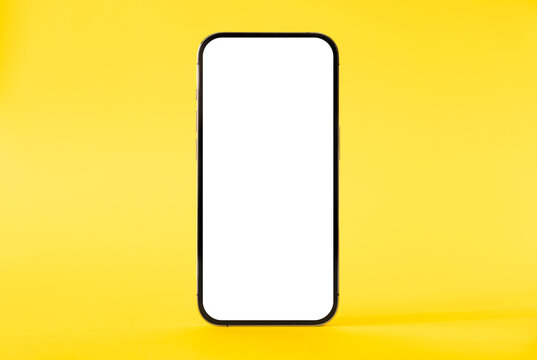 Mobile phone mockup on yellow background