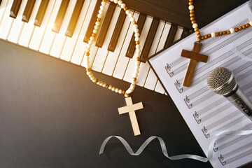 Religious music background with piano microphone and golden flash