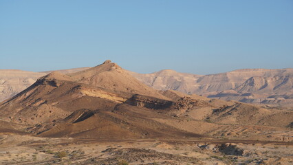 Sunrise view of HaMakhtesh HaGadol the big crater, in the Negev Desert, Southern Israel. It is a geological landform of a large erosion cirque