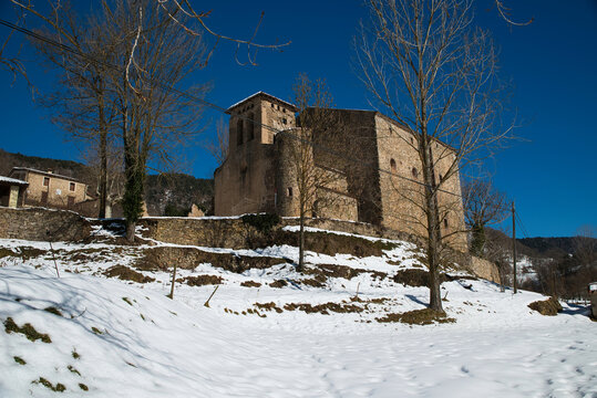 Vallfogona de Ripoll&egrave;s. Girona Spain. Photograph of the church of San Juli&aacute;n with snow.