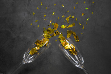 Cheers, Two glasses of champagne with gold decoration Celebration concept, top view party concept