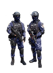 Police special unit standing arm with automatic weapon.