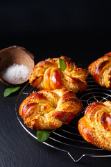 Food concept Homemade inside out hong kong coconut bun on black background with copy space