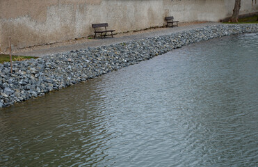 pond sluice, water reservoirs with regulation and concrete dam shaft. guide profiles determining...
