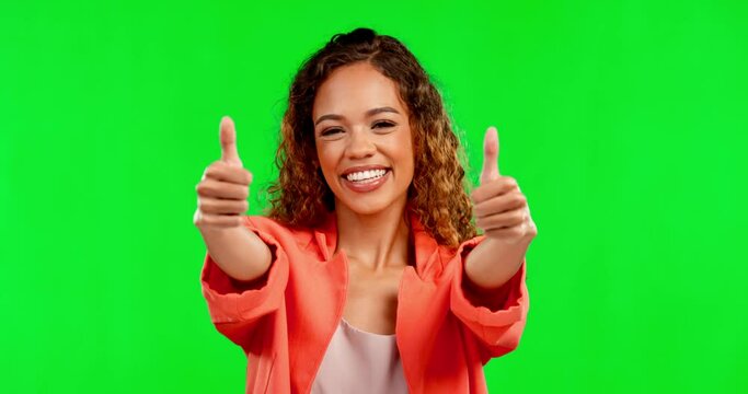 Face, smile and woman with thumbs up on green screen in studio isolated on a background. Portrait, success and happy mixed race female with hand gesture or emoji for thank you, approval or support