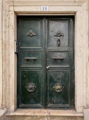 Old metal door with handles