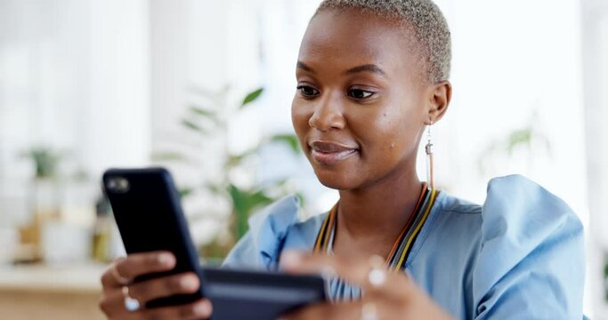 Phone, credit card and black woman online shopping in office for payment, digital banking or purchase. Business, fintech and smile of happy African female with mobile smartphone for ecommerce website