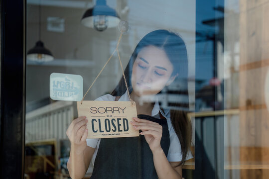 Startup Successful Sme Small Business Owner. Pretty Girl Standing In Front Of Store Holding Sign Closed For Business After Work Hours. Seller Business Idea For Entrepreneurs