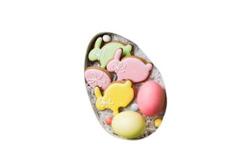 Colorful easter cookies in basket with Multi colors Easter eggs isolated on white background. Pastel color Easter eggs. holiday concept
