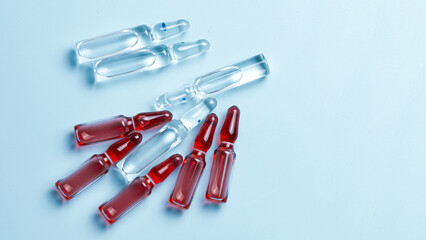 Ampoules with medical preparations or vaccine for injection on the table