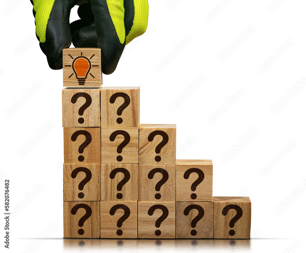 Poster concept of creative idea and innovation. gloved hand arranging wood blocks with brown question marks