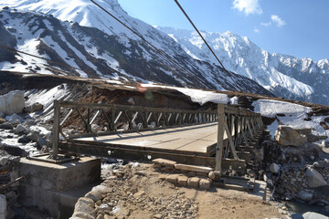 Kedarnath reconstruction project, rebuilding bridges damaged in disaster. Kedarnath was devastated...